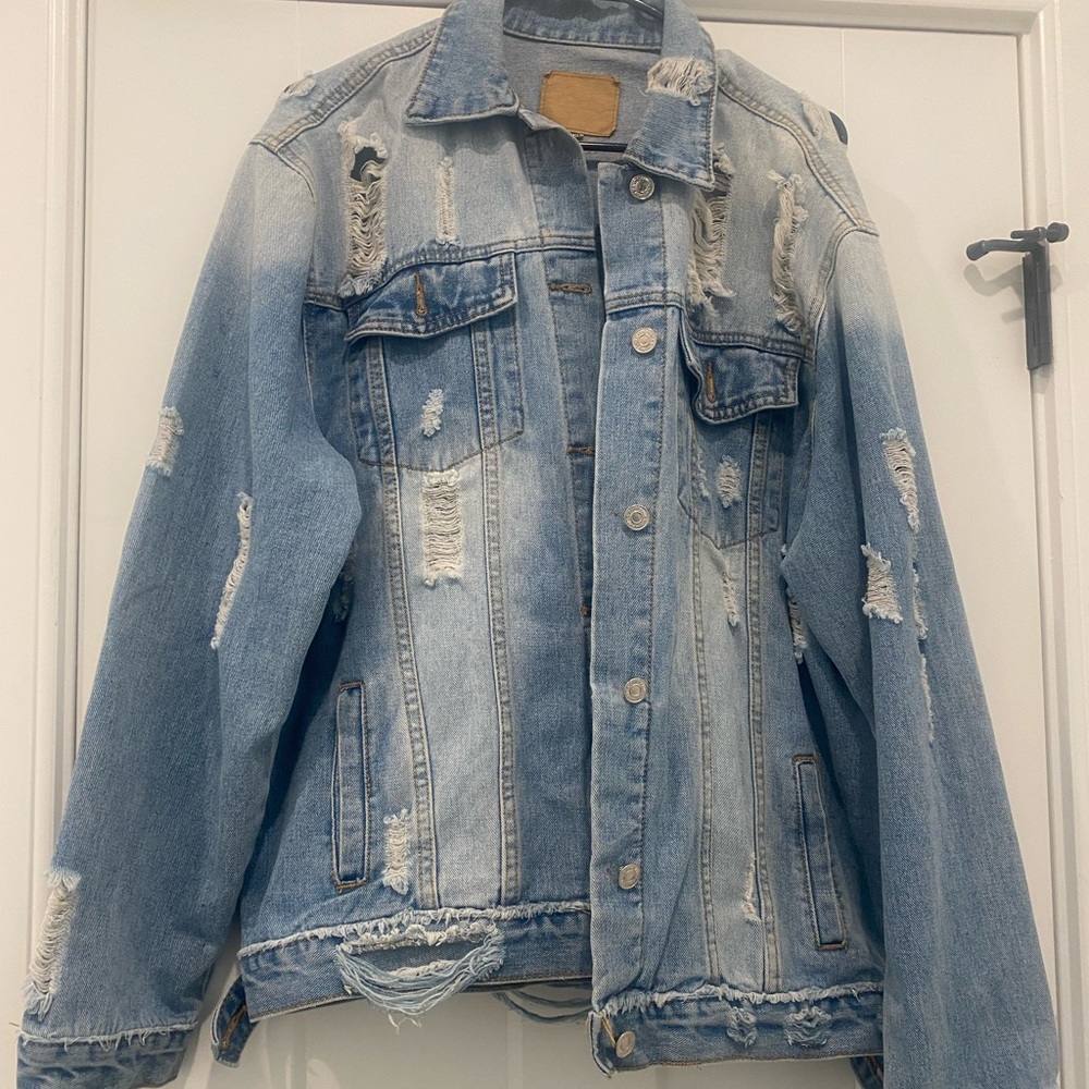 Distressed denim jacket